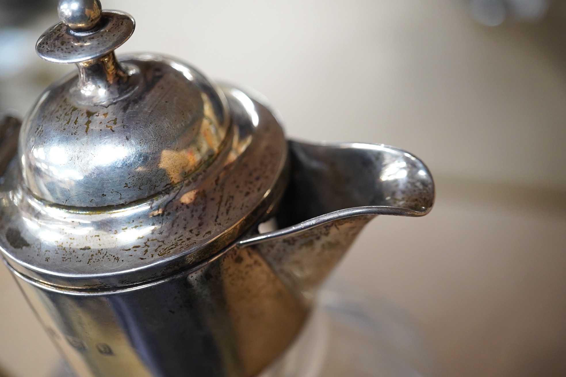 An Edwardian silver mounted glass claret jug, William Henry Leather, Birmingham, 1901, 25.3cm. Condition - poor